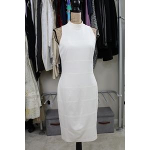 White fitted cocktail dress.